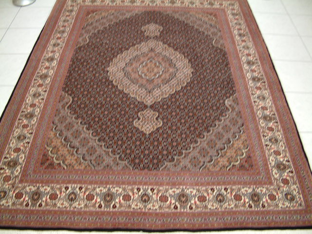 Tabriz Persian rug; All Persian Rugs are genuine handmade. Also, every Persian Tabriz rug is made of the finest kurkwool/silk.