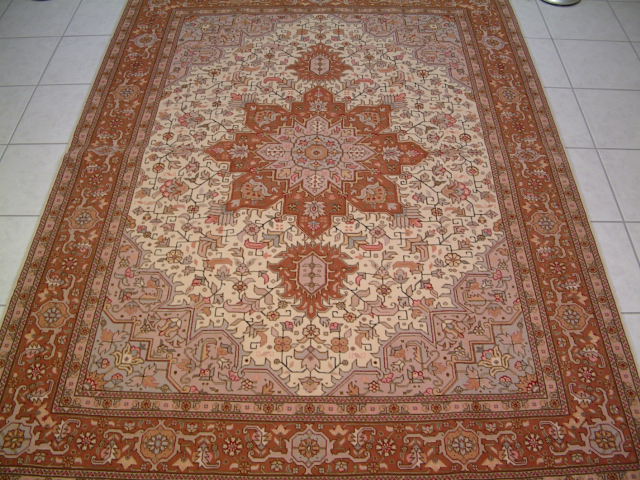 Tabriz Persian rug; All Persian Rugs are genuine handmade. Also, every Persian Tabriz rug I offer is made with fine kurkwool/silk.