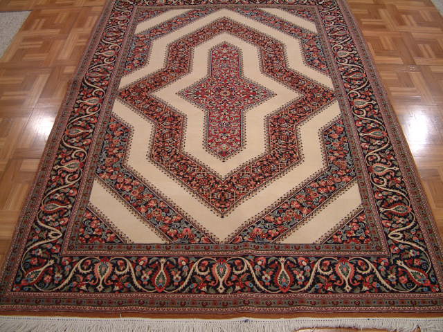 Qom Persian rug; All Persian Rugs are genuine handmade. Also, every Persian Qom rug I offer is made with pure silk only.