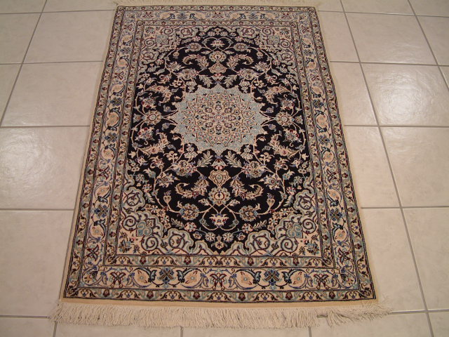 Nain Persian rug; All Persian Rugs are genuine handmade. Also, every Persian Tabriz rug I offer is made with fine kurkwool/silk.