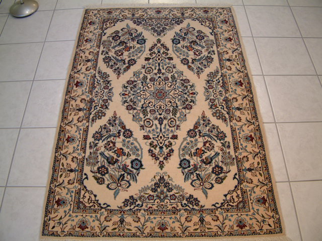 Nain Persian rug; All Persian Rugs are genuine handmade. Also, every Persian Tabriz rug I offer is made with fine kurkwool/silk.