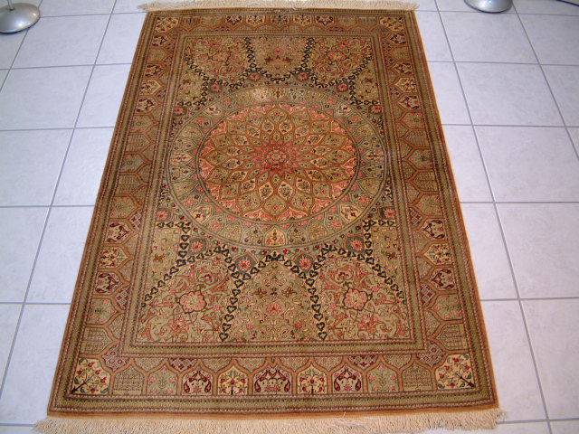 Qom Persian rug; All Persian Rugs are genuine handmade. Also, every Persian Qom rug I offer is made with pure silk only.