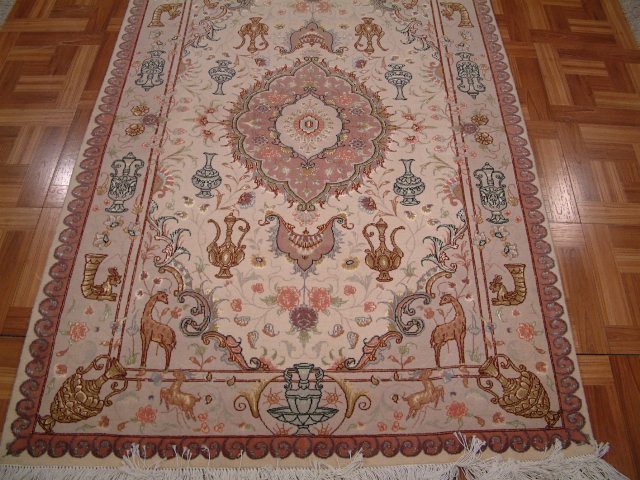 Tabriz Persian rug; All Persian Rugs are genuine handmade. Also, every Persian Tabriz rug I offer is made with fine kurkwool/silk.