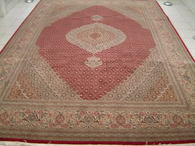 Tabriz Persian rug; All Persian Rugs are genuine handmade. Also, every Persian Tabriz rug is made of the finest kurkwool/silk.