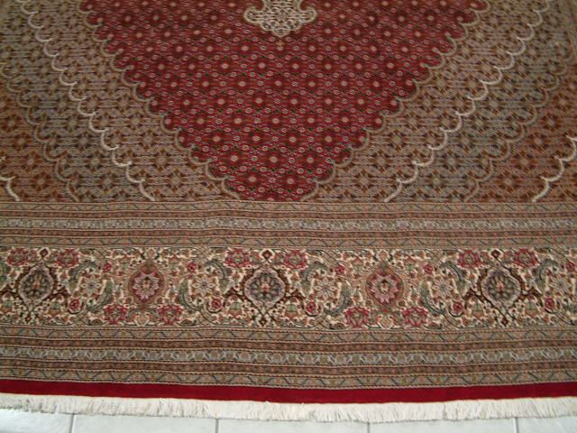 Tabriz Persian rug; All Persian Rugs are genuine handmade. Also, every Persian Tabriz rug is made of the finest kurkwool/silk.