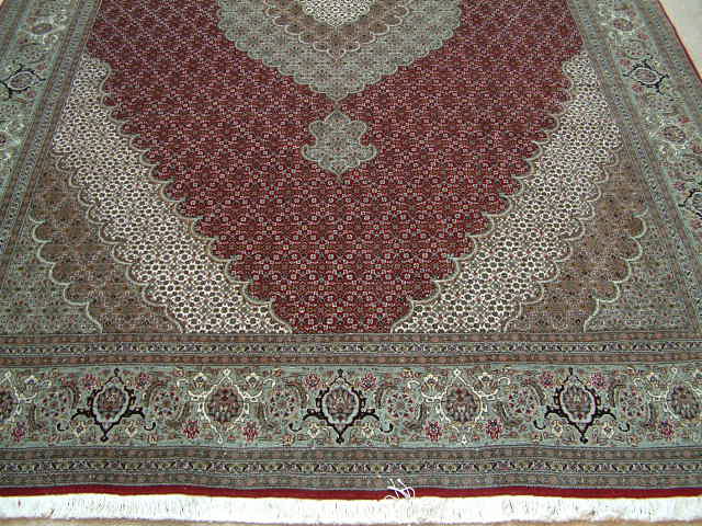 Tabriz Persian rug; All Persian Rugs are genuine handmade. Also, every Persian Tabriz rug is made of the finest kurkwool/silk.