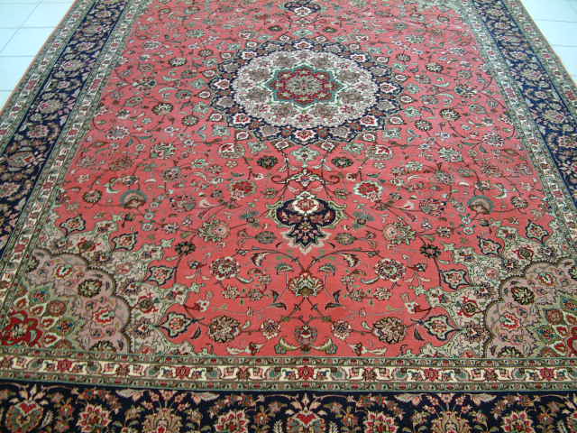 Tabriz Persian rug; All Persian Rugs are genuine handmade. Also, every Persian Tabriz rug is made of the finest kurkwool/silk.
