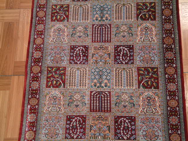 Qom Persian rug; All Persian Rugs are genuine handmade. Also, every Persian Qom rug I offer is made with pure silk only.