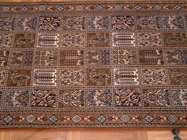 Qom Persian rug; All Persian Rugs are genuine handmade. Also, every Persian Qom rug I offer is made with pure silk only.