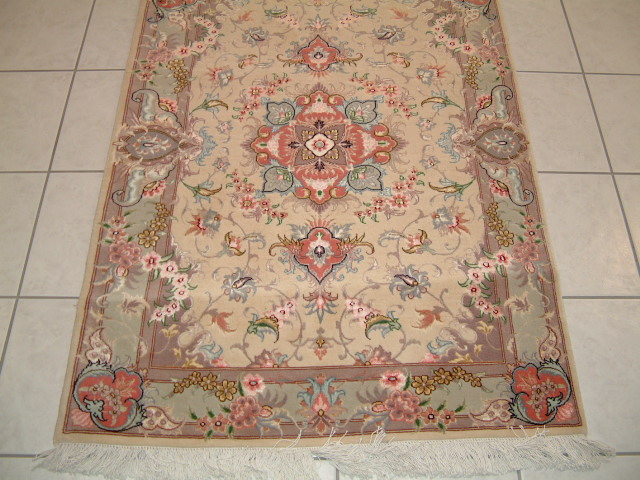 Tabriz Persian rug; All Persian Rugs are genuine handmade. Also, every Persian Tabriz rug I offer is made with fine kurkwool/silk.