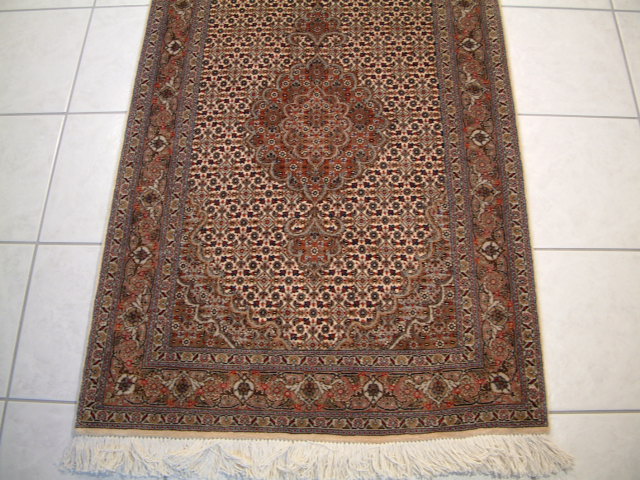 Tabriz Persian rug; All Persian Rugs are genuine handmade. Also, every Persian Tabriz rug I offer is made with fine kurkwool/silk.