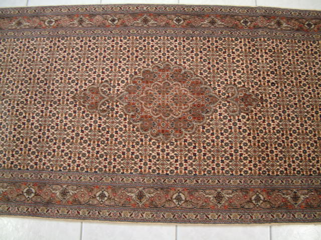 Tabriz Persian rug; All Persian Rugs are genuine handmade. Also, every Persian Tabriz rug I offer is made with fine kurkwool/silk.