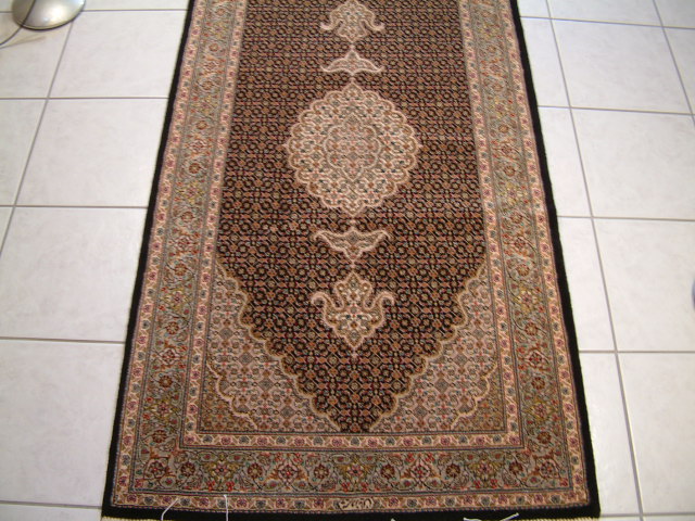 Tabriz Persian rug; All Persian Rugs are genuine handmade. Also, every Persian Tabriz rug I offer is made with fine kurkwool/silk.