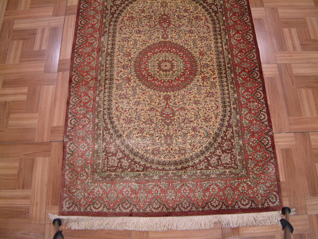 Qom Persian rug; All Persian Rugs are genuine handmade. Also, every Persian Qom rug I offer is made of pure silk only.