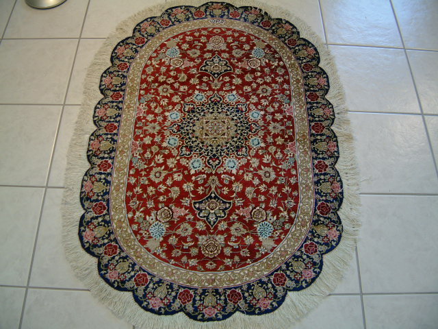 Qom Persian rug; All Persian Rugs are genuine handmade. Also, every Persian Qom rug I offer is made of pure silk only.